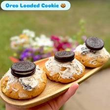 A chocolate sandwich cookie with a white creme filling.