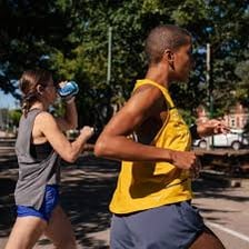 A runner breathing heavily after exercise.