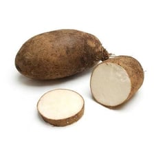 A whole potato, a common root vegetable.