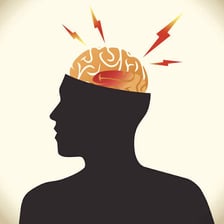 A person touching their head while experiencing pain