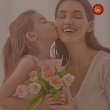 A mother and daughter sharing an affectionate conversation.