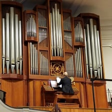 A large pipe organ inside a church