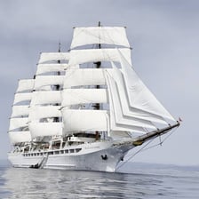 A vessel cruising across open water.