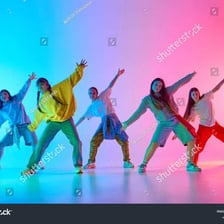 A dancer performing with lively energy and style