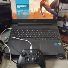 A personal computer set up for gaming with an Xbox controller