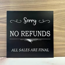 A retail sign stating that all sales are final.
