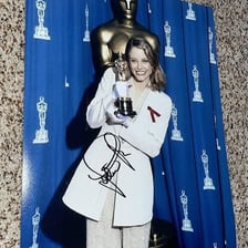 A portrait of actress Jodie Foster at an awards event.