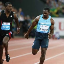 An athlete competing with intense focus and effort.