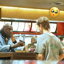 A hungry person asking for food at a dinner table
