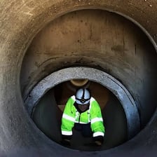 Large underground sewer pipe carrying wastewater
