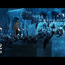 An orc warrior depicted in a fantasy battle scene.