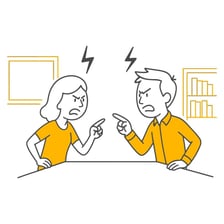 Two people in conversation during a moment of disagreement