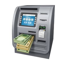 An automated teller machine being used to withdraw cash.