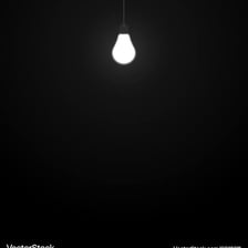 A bright light source glowing against a dark background.