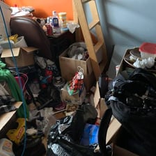 A cluttered, untidy room.