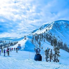 Snow-covered ski slopes and mountain scenery near Alta, Utah.