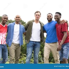 A group of male friends standing together