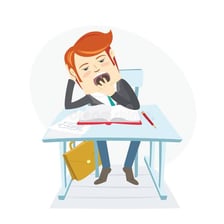 Person yawning during an uninteresting lecture.