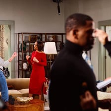 Actors performing a dramatic scene for a daytime television soap opera