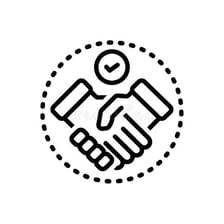 Two people shaking hands after reaching an agreement.