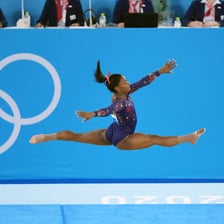 Simone Biles performing an Olympic gymnastics routine
