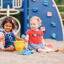 A group of young children playing together.