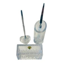 An office desk set with writing accessories.