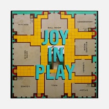 A Clue board game board showing rooms and secret passages.