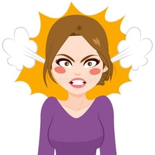 An angry person shown fuming with frustration