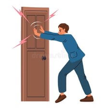A person closing a door as a visual symbol of emotional closure