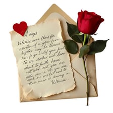 A handwritten romantic letter beside a sealed envelope.