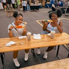 A person eating food from a kitchen grocery haul.
