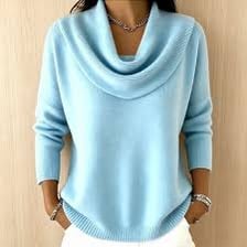 A sweater displaying a loose, draped cowl neckline.