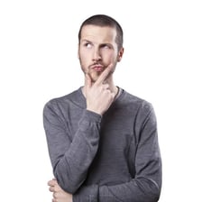 A thoughtful person with a calm, focused expression.