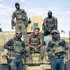 A split scene showing a posed photo opportunity and special-operations soldiers.