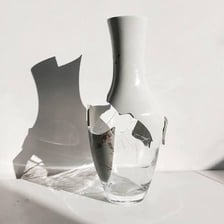 A broken object with its pieces separated.