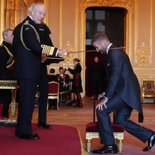 A formal British knighthood ceremony