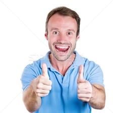 An enthusiastic person giving a thumbs-up gesture.
