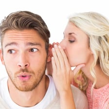 A person with a strained voice whispering.