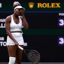 Venus Williams playing tennis at Wimbledon