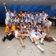 Women athletes celebrating for Team USA