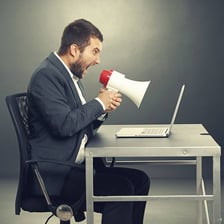 A person writing a critical comment online