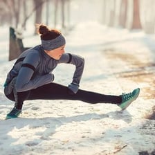 A person enduring difficult outdoor conditions during training