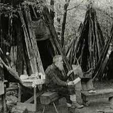 A solitary person near a secluded cabin
