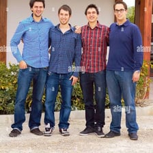 A group of adult men standing together.