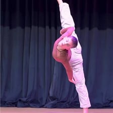 A dancer performing with lively energy and style