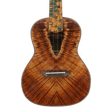 A ukulele made from distinctive Hawaiian koa wood.