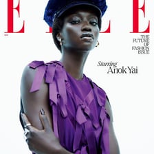 A cover of ELLE fashion magazine featuring a model and fashion headlines.
