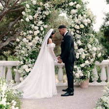 A groom standing at a wedding ceremony