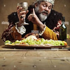 A person eating a meal at a dinner table.